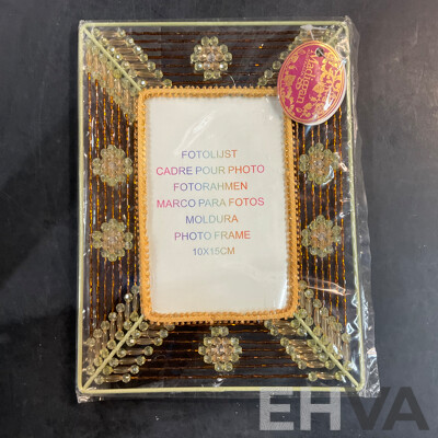 Assorted Photo Frames, Albums, and Wishing Cards