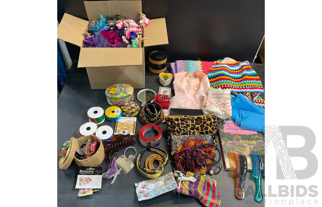 Assorted Household Items and a Box of Artificial Flowers for Decoration or Hair