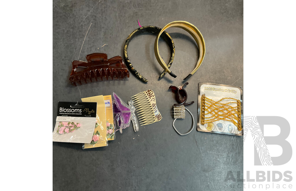 Assorted Household Items and a Box of Artificial Flowers for Decoration or Hair