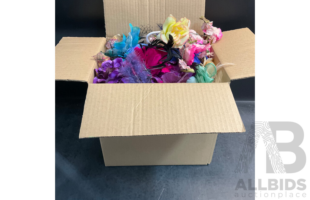 Assorted Household Items and a Box of Artificial Flowers for Decoration or Hair