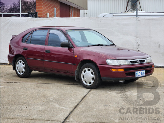 5/1999 Toyota Corolla Conquest SECA AE102R 5d Liftback Maroon 1.8L