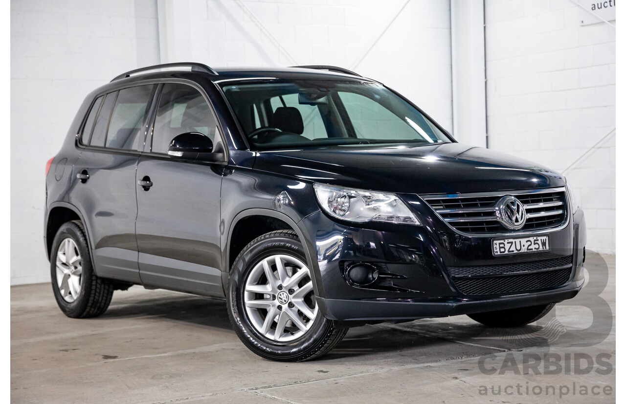 7/2011 Volkswagen Tiguan 125 TSI 5NC MY11 4d Wagon Deep Black Pearl Turbo 2.0L