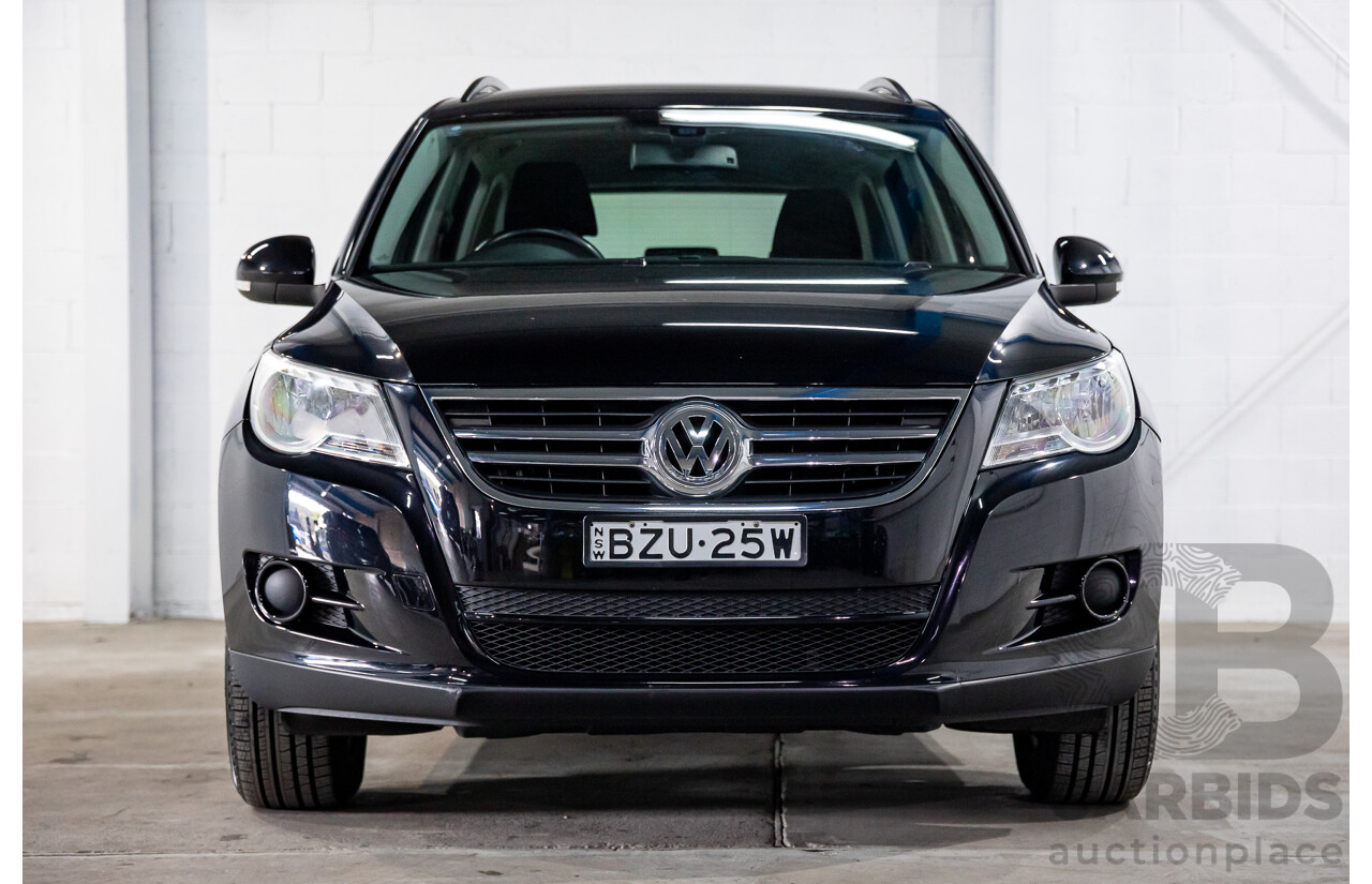 7/2011 Volkswagen Tiguan 125 TSI 5NC MY11 4d Wagon Deep Black Pearl Turbo 2.0L