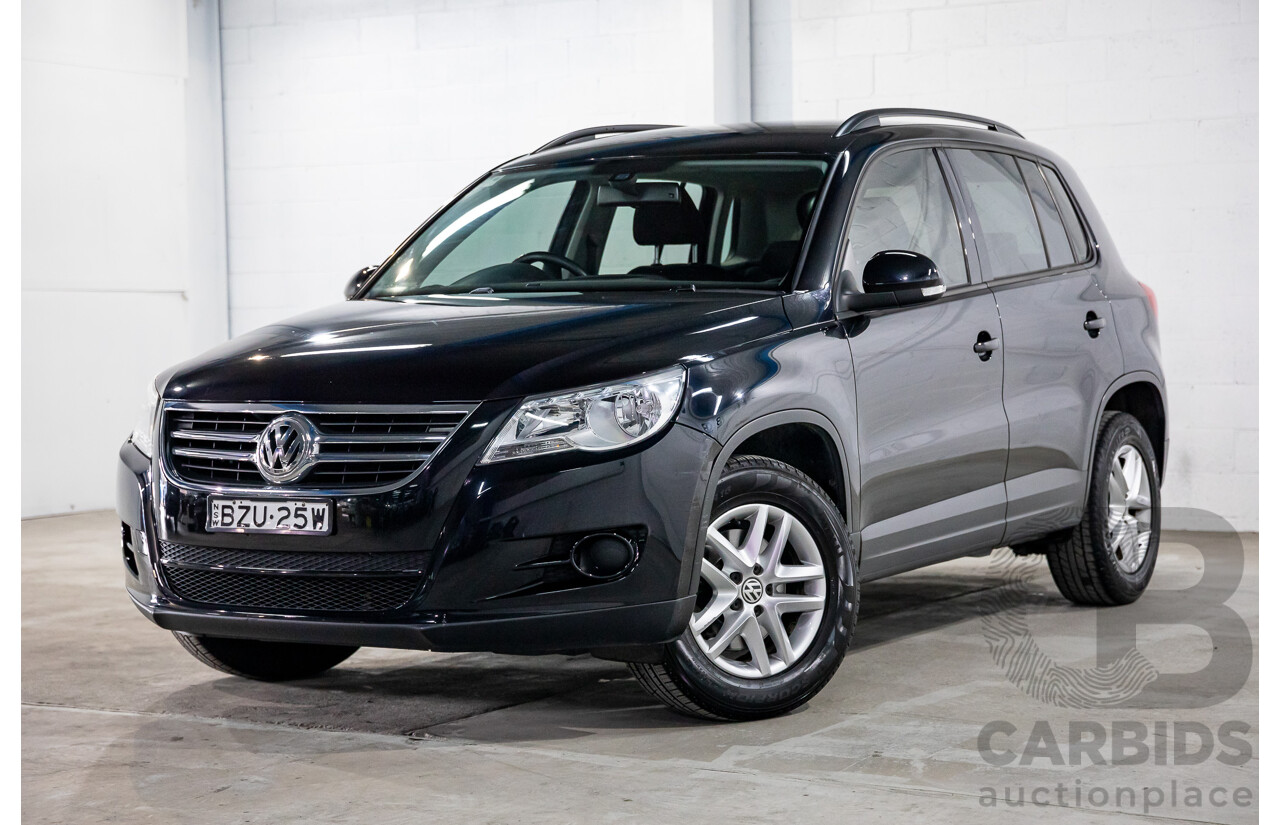 7/2011 Volkswagen Tiguan 125 TSI 5NC MY11 4d Wagon Deep Black Pearl Turbo 2.0L