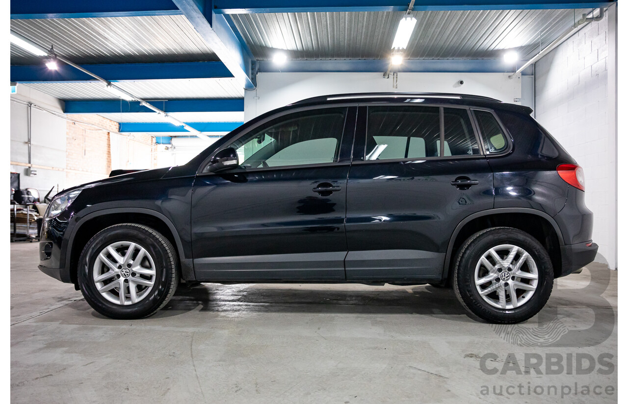 7/2011 Volkswagen Tiguan 125 TSI 5NC MY11 4d Wagon Deep Black Pearl Turbo 2.0L
