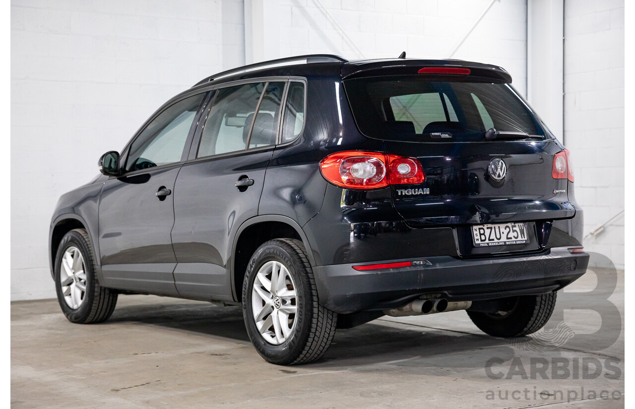 7/2011 Volkswagen Tiguan 125 TSI 5NC MY11 4d Wagon Deep Black Pearl Turbo 2.0L