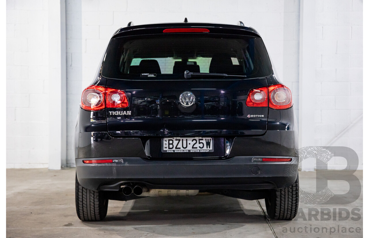 7/2011 Volkswagen Tiguan 125 TSI 5NC MY11 4d Wagon Deep Black Pearl Turbo 2.0L