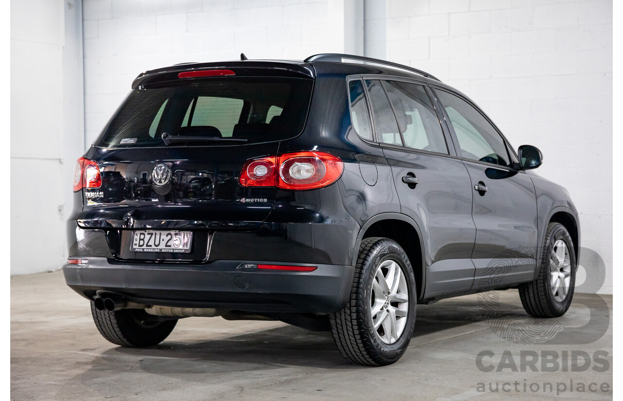 7/2011 Volkswagen Tiguan 125 TSI 5NC MY11 4d Wagon Deep Black Pearl Turbo 2.0L