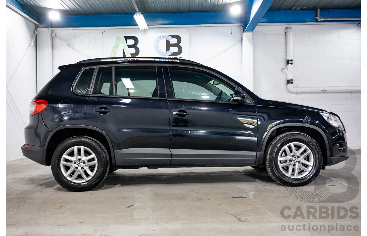 7/2011 Volkswagen Tiguan 125 TSI 5NC MY11 4d Wagon Deep Black Pearl Turbo 2.0L