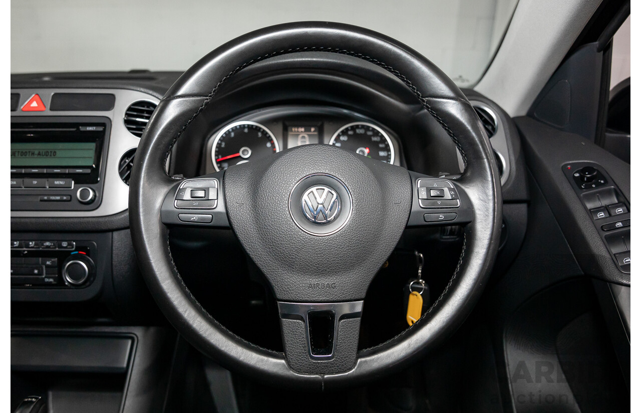 7/2011 Volkswagen Tiguan 125 TSI 5NC MY11 4d Wagon Deep Black Pearl Turbo 2.0L