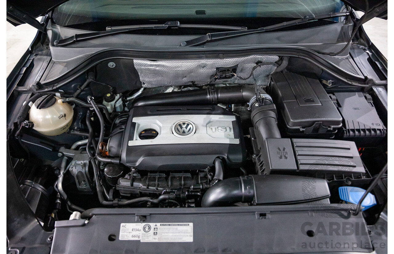 7/2011 Volkswagen Tiguan 125 TSI 5NC MY11 4d Wagon Deep Black Pearl Turbo 2.0L