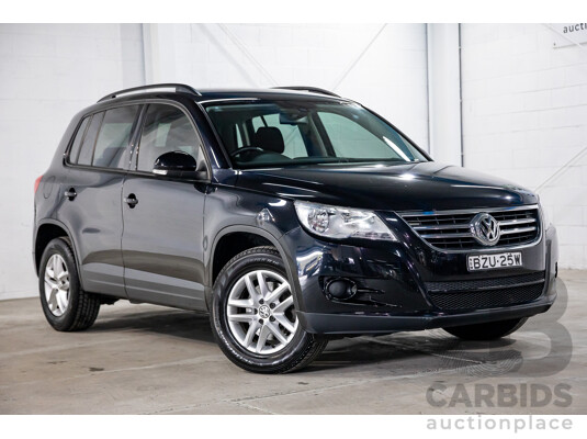 7/2011 Volkswagen Tiguan 125 TSI 5NC MY11 4d Wagon Deep Black Pearl Turbo 2.0L