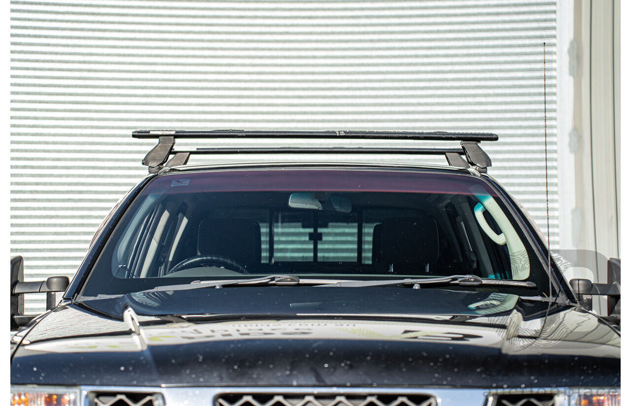 4/2011 Nissan Navara ST (4x4) D40 Dual Cab P/Up Midnight Black Metallic Turbo Diesel 2.5L