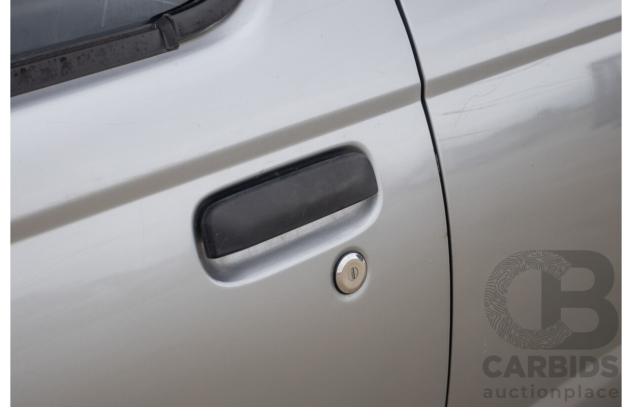 12/2011 Nissan Navara ST-R (4x4) D22 MY08 Dual Cab P/Up Silver 2.5L