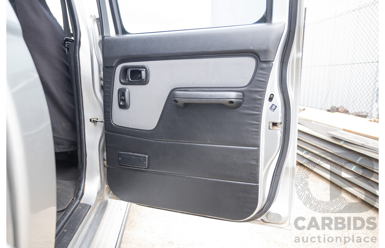12/2011 Nissan Navara ST-R (4x4) D22 MY08 Dual Cab P/Up Silver 2.5L