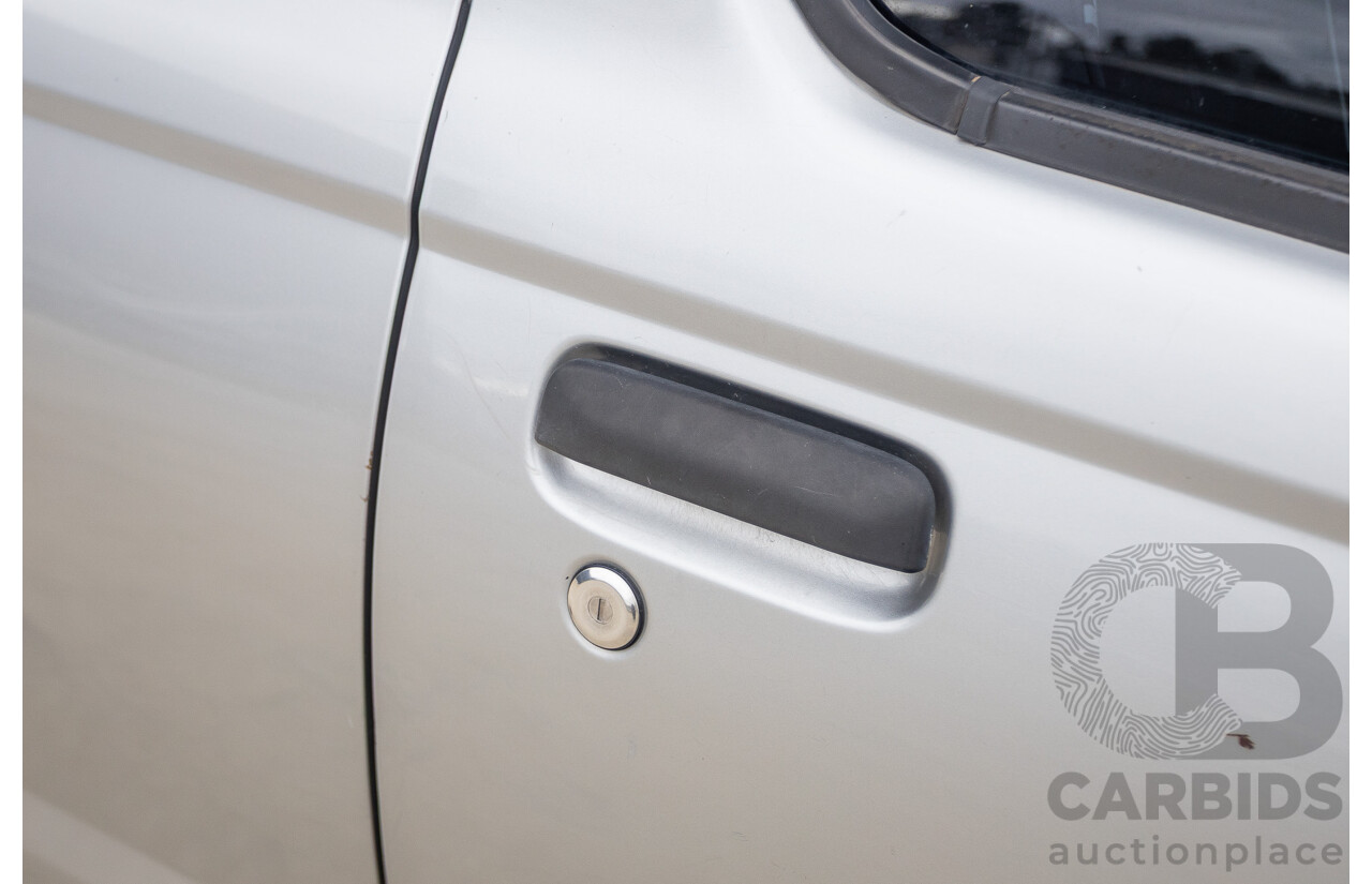 12/2011 Nissan Navara ST-R (4x4) D22 MY08 Dual Cab P/Up Silver 2.5L