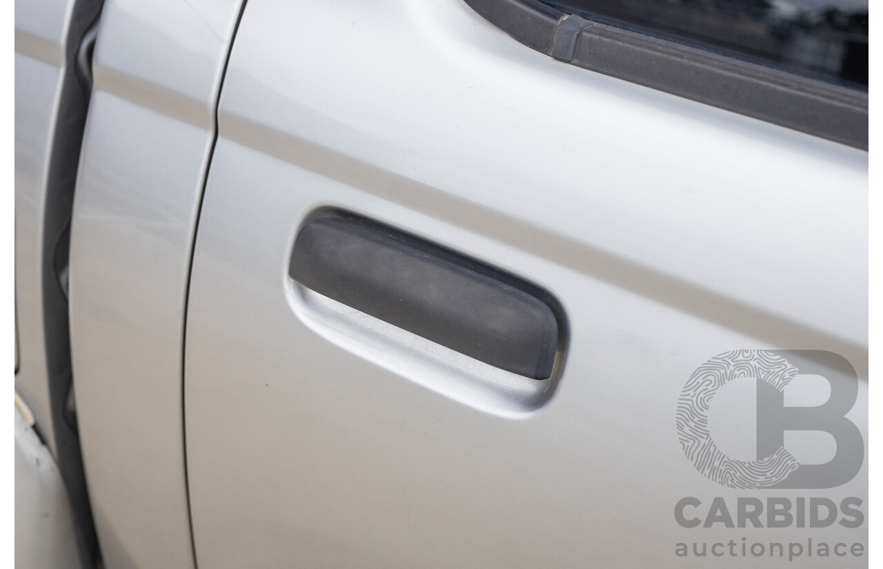12/2011 Nissan Navara ST-R (4x4) D22 MY08 Dual Cab P/Up Silver 2.5L