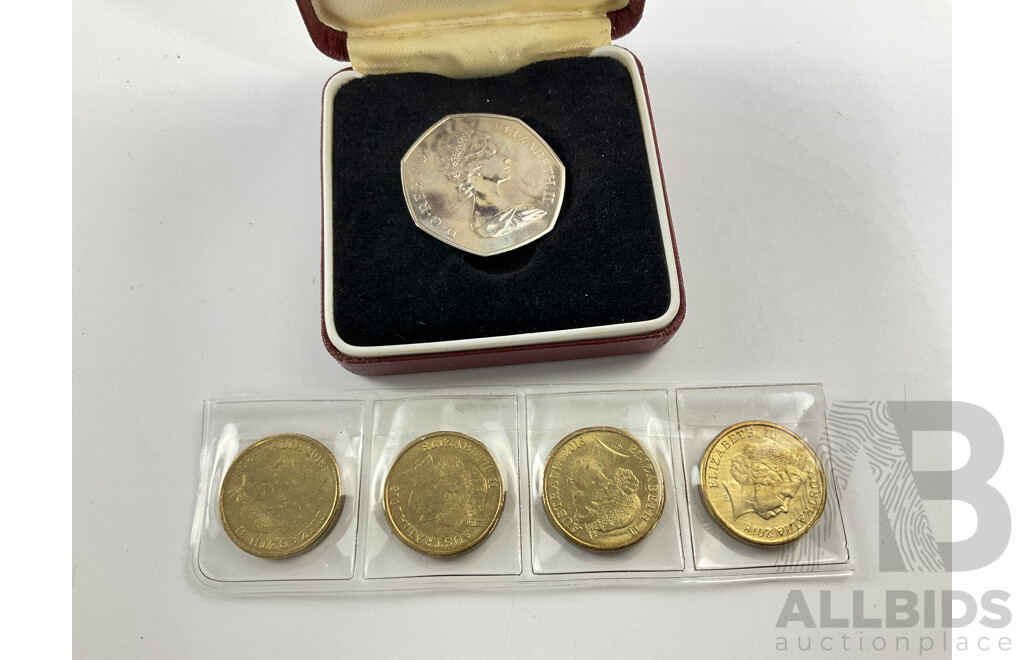 Four Australian 2018 Two Dollar Coins, Lest We Forget and United Kingdom Royal Mint 1973 Commemorative Fifty Pence