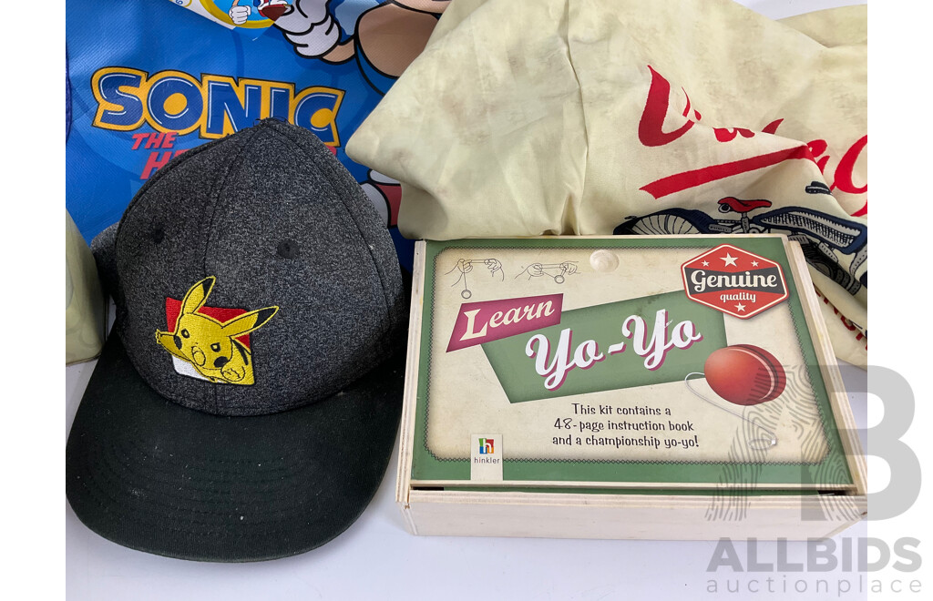 Collection of Vintage Tazos Including Looney Tunes, Space Jam, the Simpsons with Learn Yo Yo Kit, Pokemon Hat, Sonic the Hedge Hog Bag, Tiny Teddy and Flower Tins, Vintage Riders Shorts