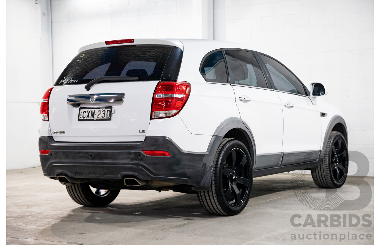 2/2015 Holden Captiva 7 LS (FWD) CG MY15 4d Wagon Summit White 2.4L - 7 Seater