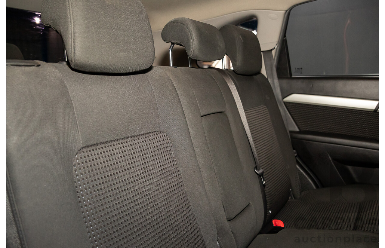 2/2015 Holden Captiva 7 LS (FWD) CG MY15 4d Wagon Summit White 2.4L - 7 Seater