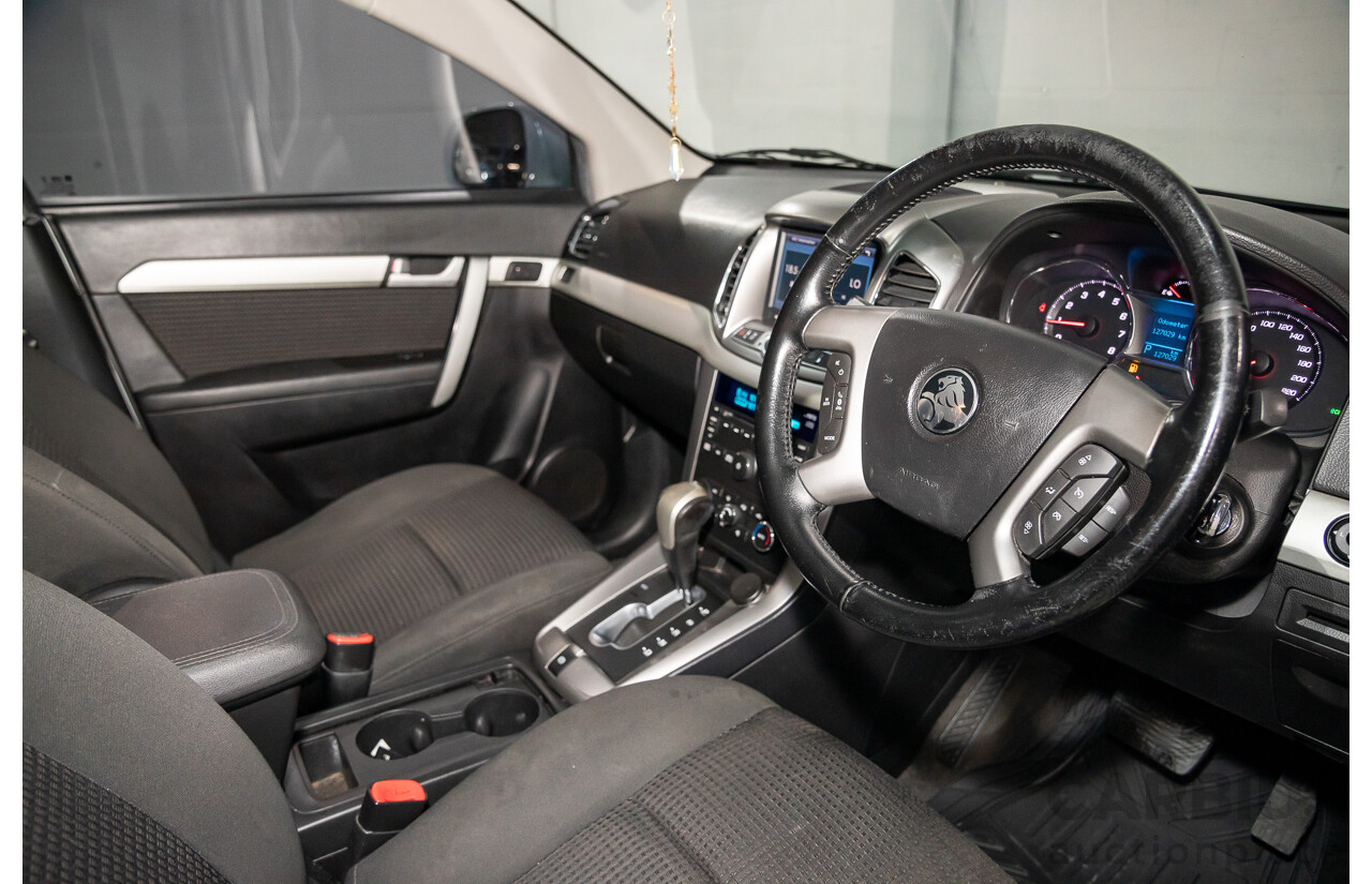 2/2015 Holden Captiva 7 LS (FWD) CG MY15 4d Wagon Summit White 2.4L - 7 Seater