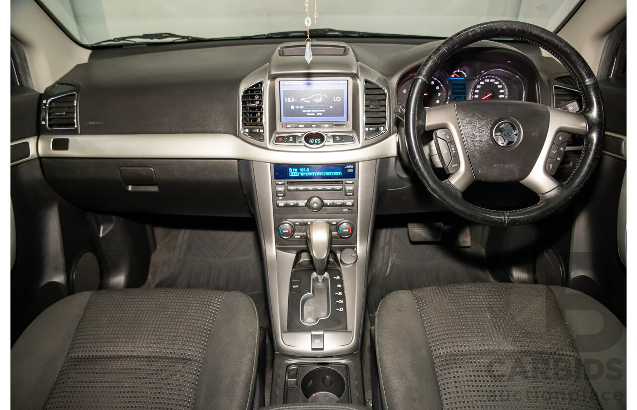 2/2015 Holden Captiva 7 LS (FWD) CG MY15 4d Wagon Summit White 2.4L - 7 Seater