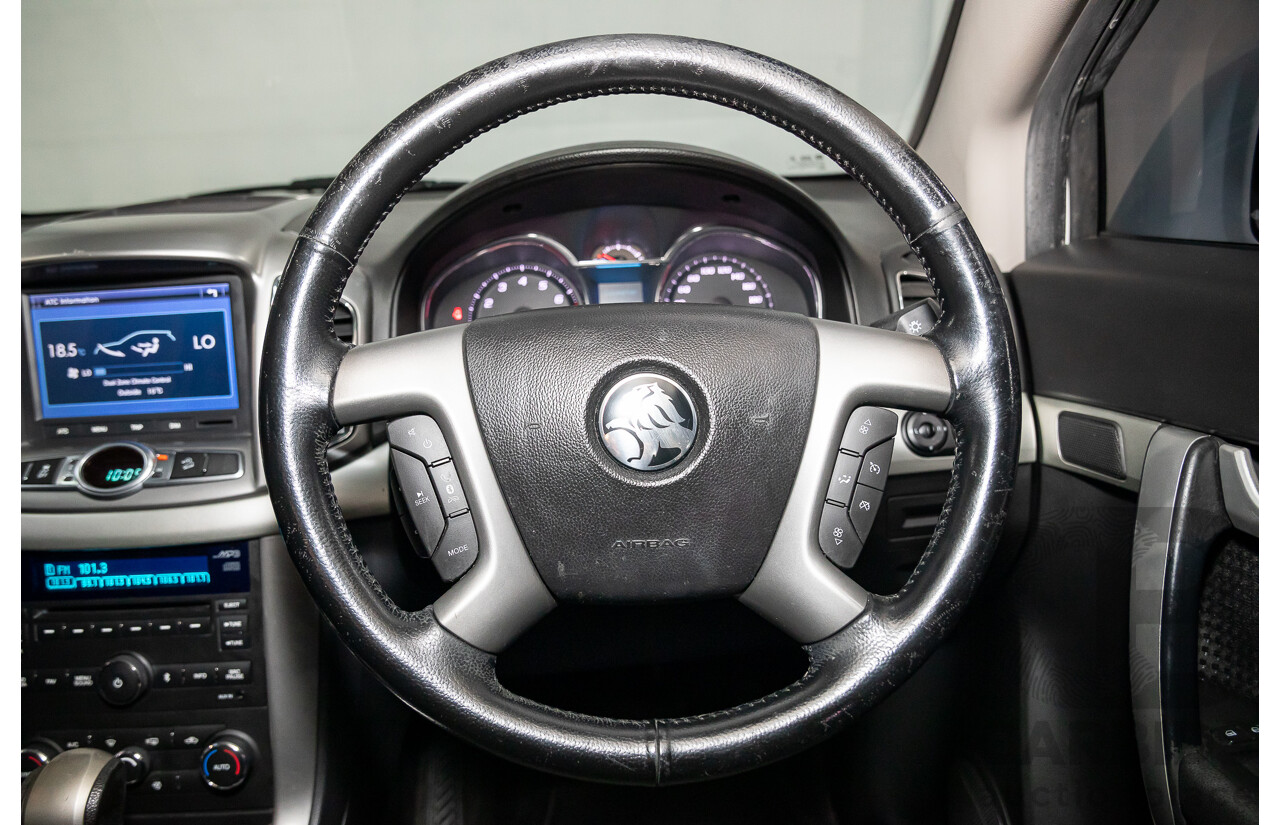 2/2015 Holden Captiva 7 LS (FWD) CG MY15 4d Wagon Summit White 2.4L - 7 Seater