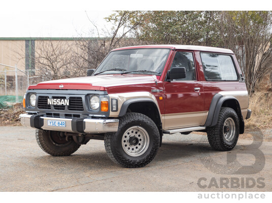 10/1994 Nissan Patrol ST SWB Series 2 (4x4) KY60 GQ 2d Hardtop Big Red / Desert Sand 4.2L