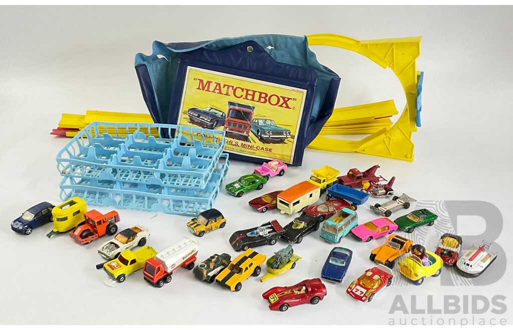 Collection of Vintage Diecast Matchbox Vehicles with Car Case and Loop Track