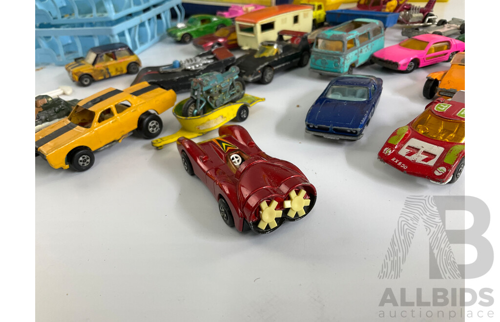 Collection of Vintage Diecast Matchbox Vehicles with Car Case and Loop Track