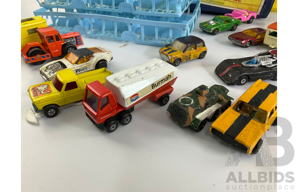 Collection of Vintage Diecast Matchbox Vehicles with Car Case and Loop Track