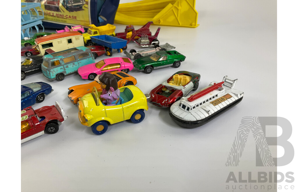 Collection of Vintage Diecast Matchbox Vehicles with Car Case and Loop Track