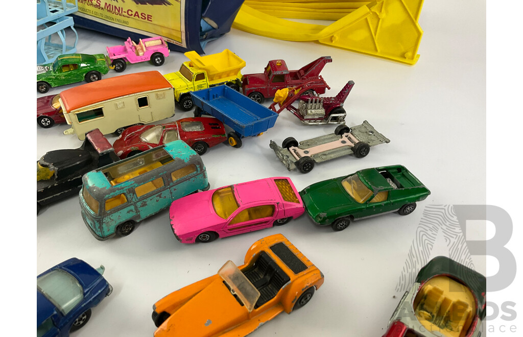 Collection of Vintage Diecast Matchbox Vehicles with Car Case and Loop Track