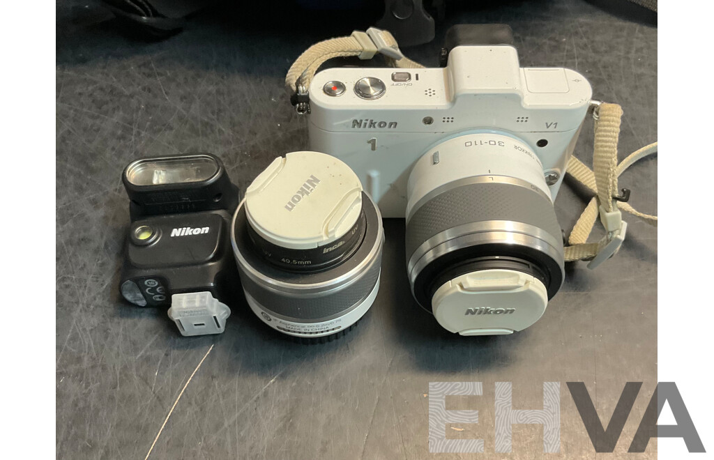 NIKON V1 Digital Camera with 10-30mm & 30-110 Mm Lens & SB-N5 Flash with Lowepro Camera Bag