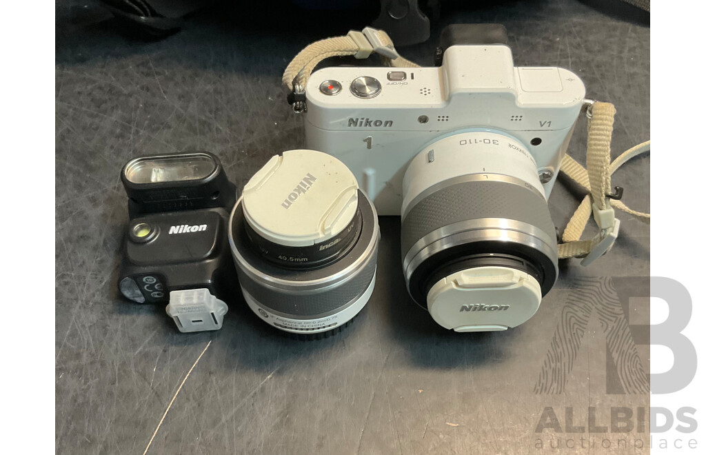 NIKON V1 Digital Camera with 10-30mm & 30-110 Mm Lens & SB-N5 Flash with Lowepro Camera Bag