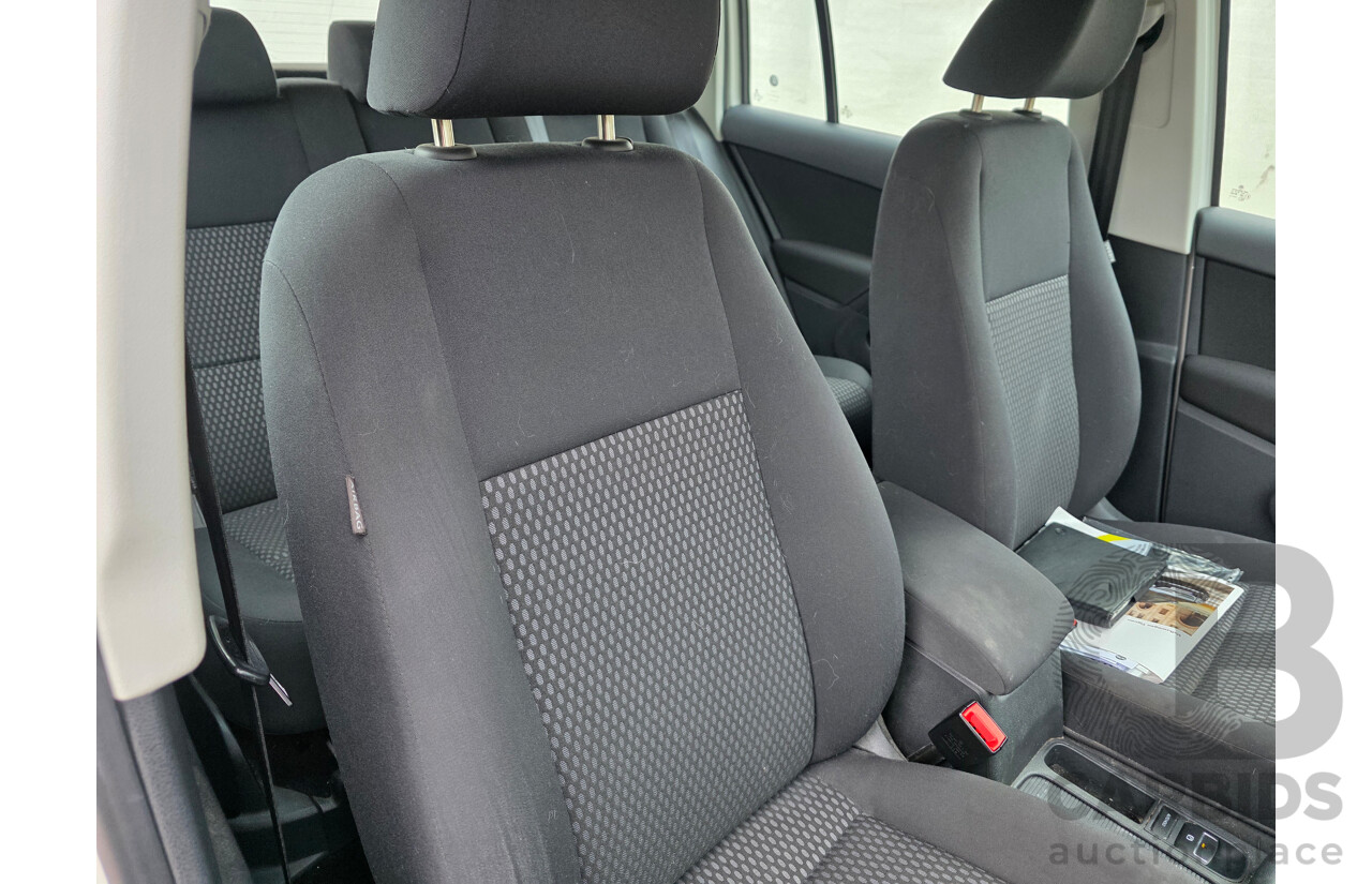 9/2010 Volkswagen Tiguan 103 TDI 5NC MY10 4d Wagon White 2.0L