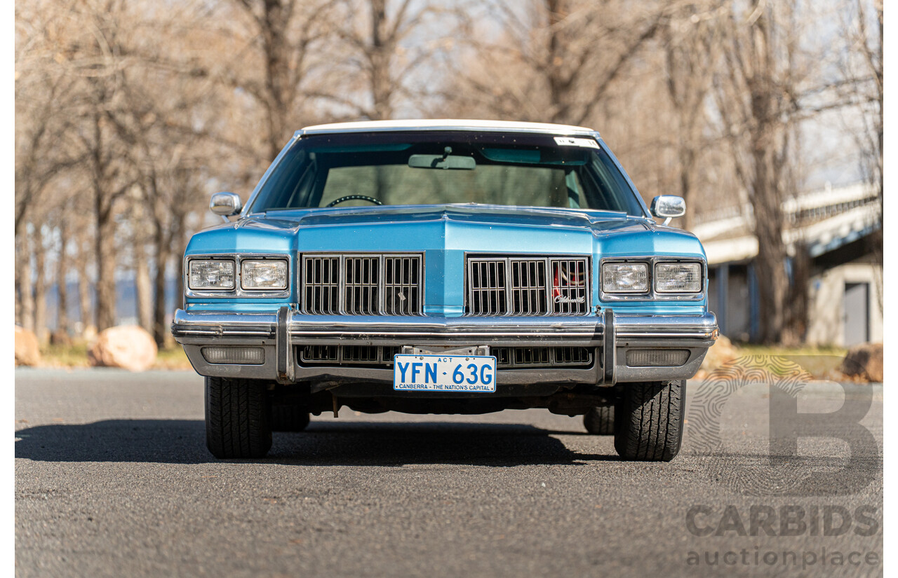 01/1975 Oldsmobile Ninety-Eight 98 Luxury 4d Sedan Specter Blue / White Vinyl V8 455ci V8 7.5L