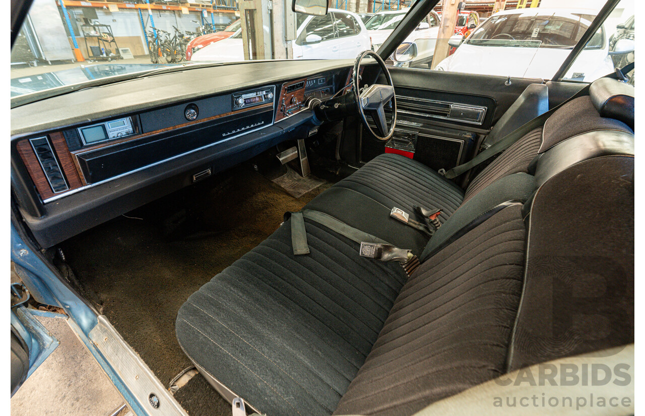 01/1975 Oldsmobile Ninety-Eight 98 Luxury 4d Sedan Specter Blue / White Vinyl V8 455ci V8 7.5L