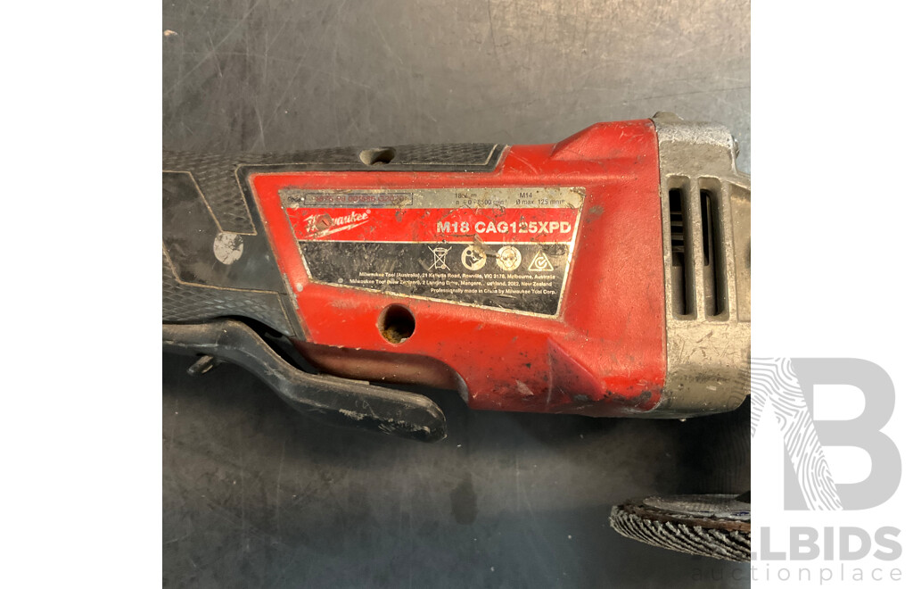 Assorted Milwaukee Tools Includs Rotary Hammer , Angle Grinder , Blower , Batteries & More - Lot of 9
