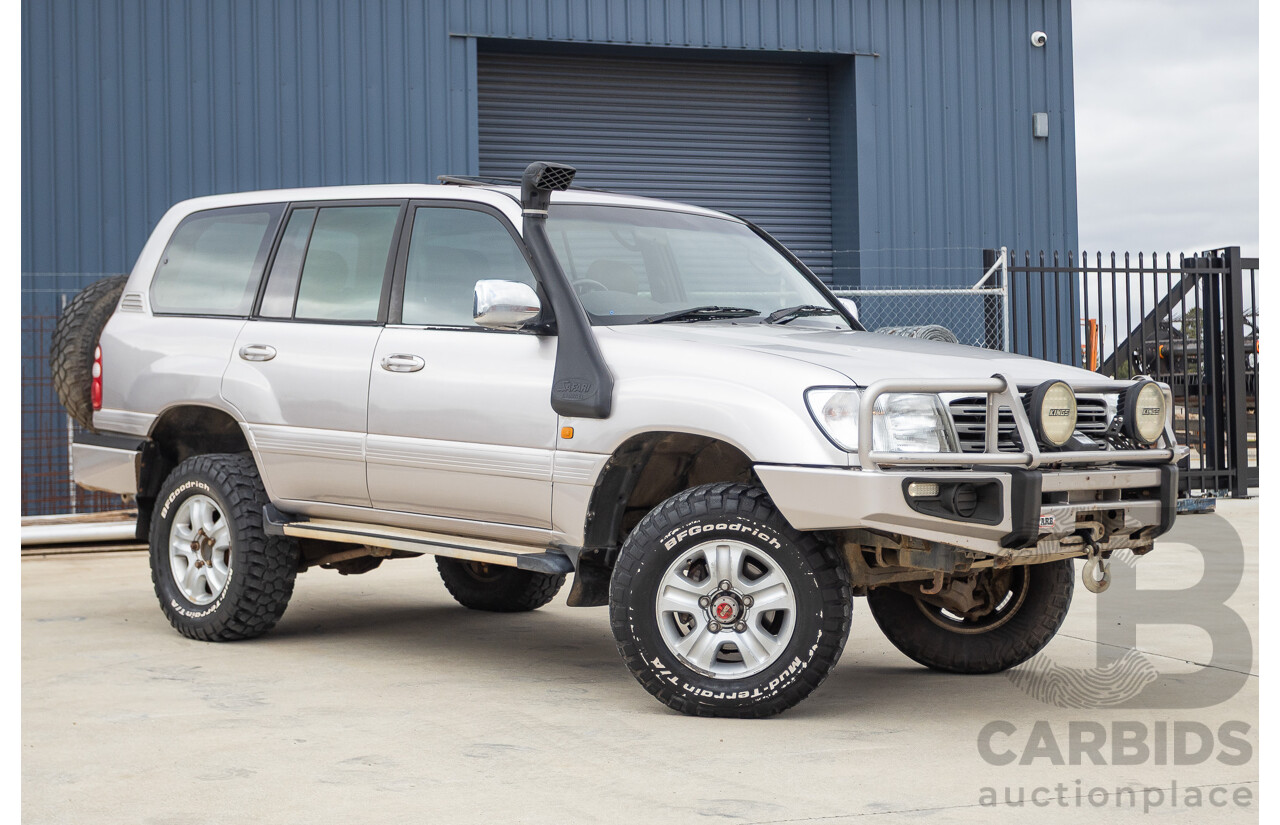 2/2004 Toyota Landcruiser Sahara (4x4) UZJ100R 4d Wagon Warm Silver Metallic V8 4.7L