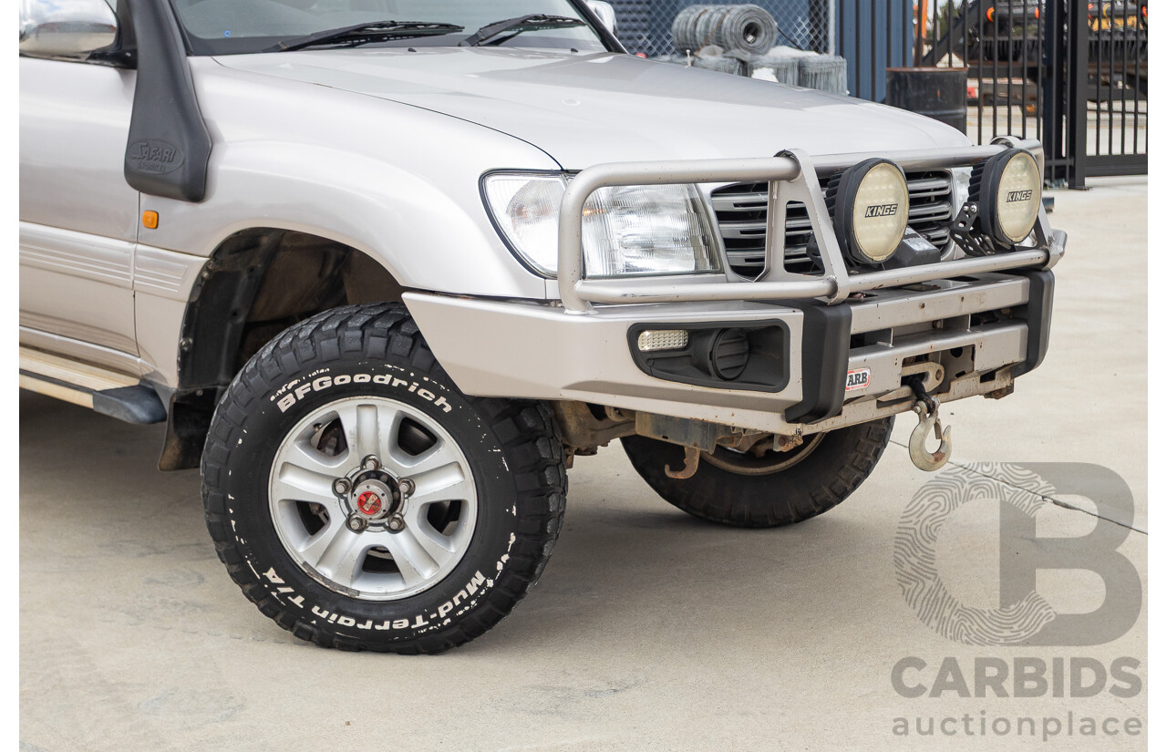 2/2004 Toyota Landcruiser Sahara (4x4) UZJ100R 4d Wagon Warm Silver Metallic V8 4.7L