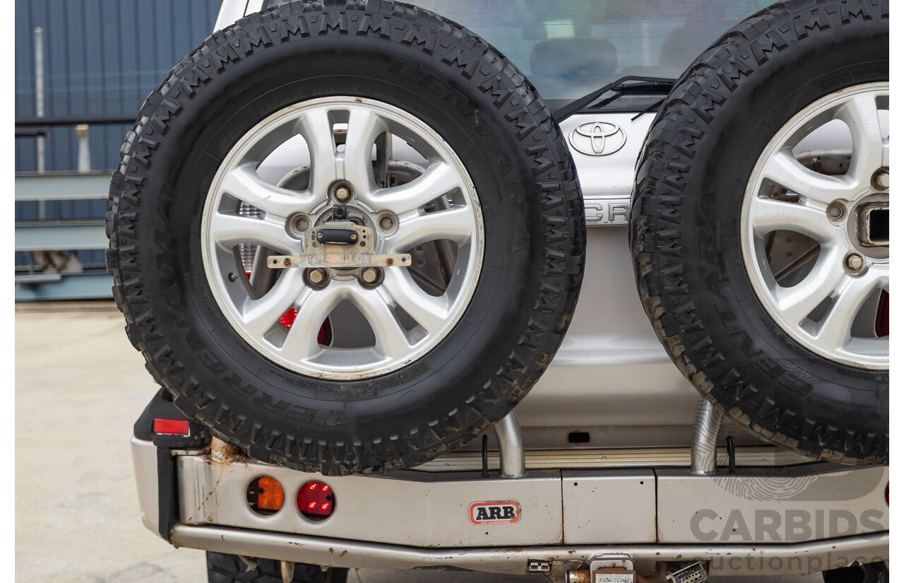 2/2004 Toyota Landcruiser Sahara (4x4) UZJ100R 4d Wagon Warm Silver Metallic V8 4.7L