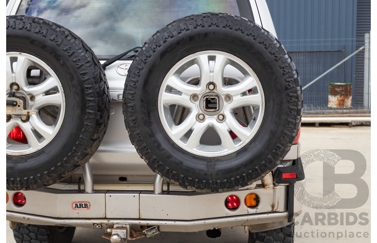2/2004 Toyota Landcruiser Sahara (4x4) UZJ100R 4d Wagon Warm Silver Metallic V8 4.7L