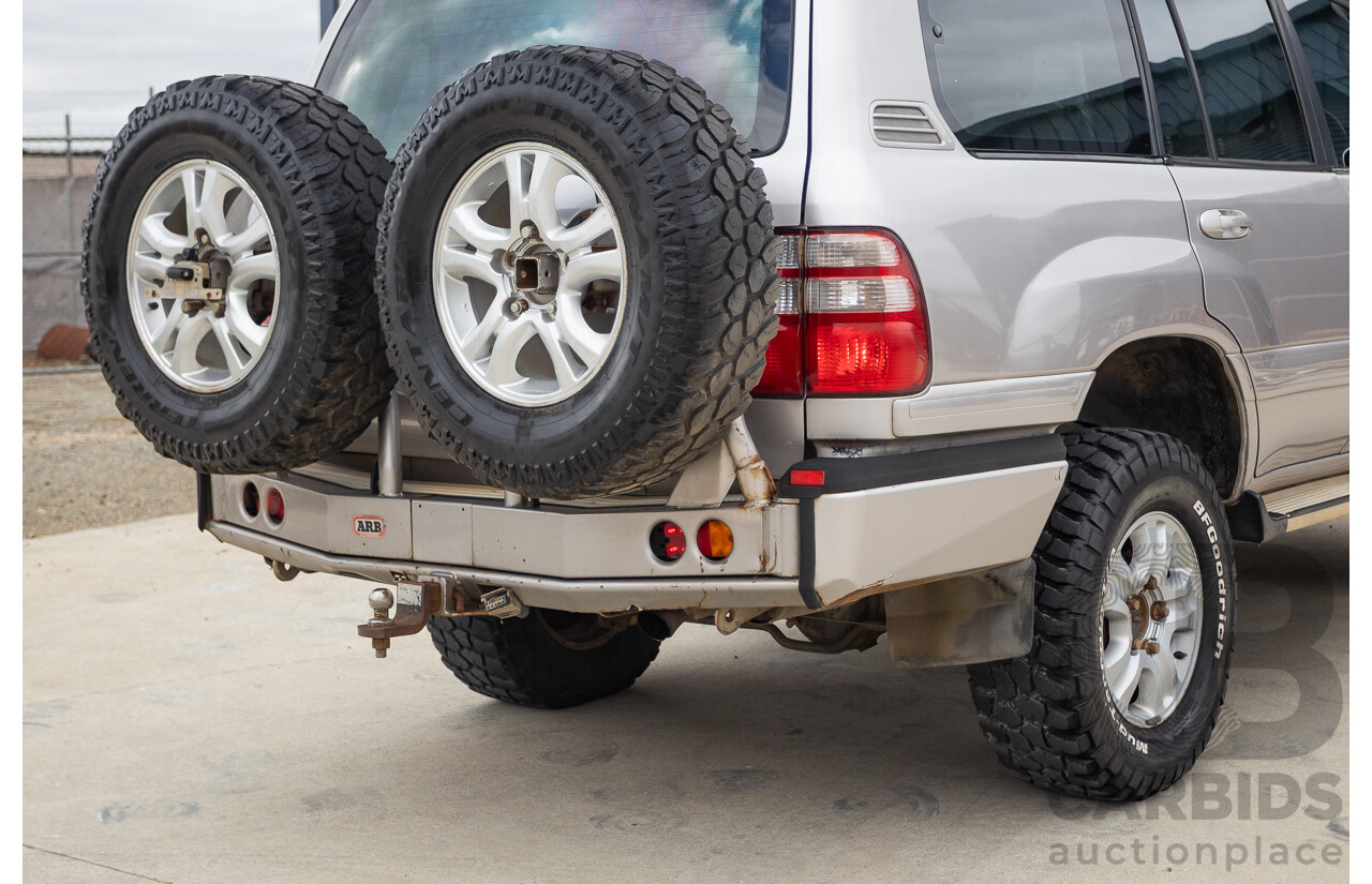 2/2004 Toyota Landcruiser Sahara (4x4) UZJ100R 4d Wagon Warm Silver Metallic V8 4.7L