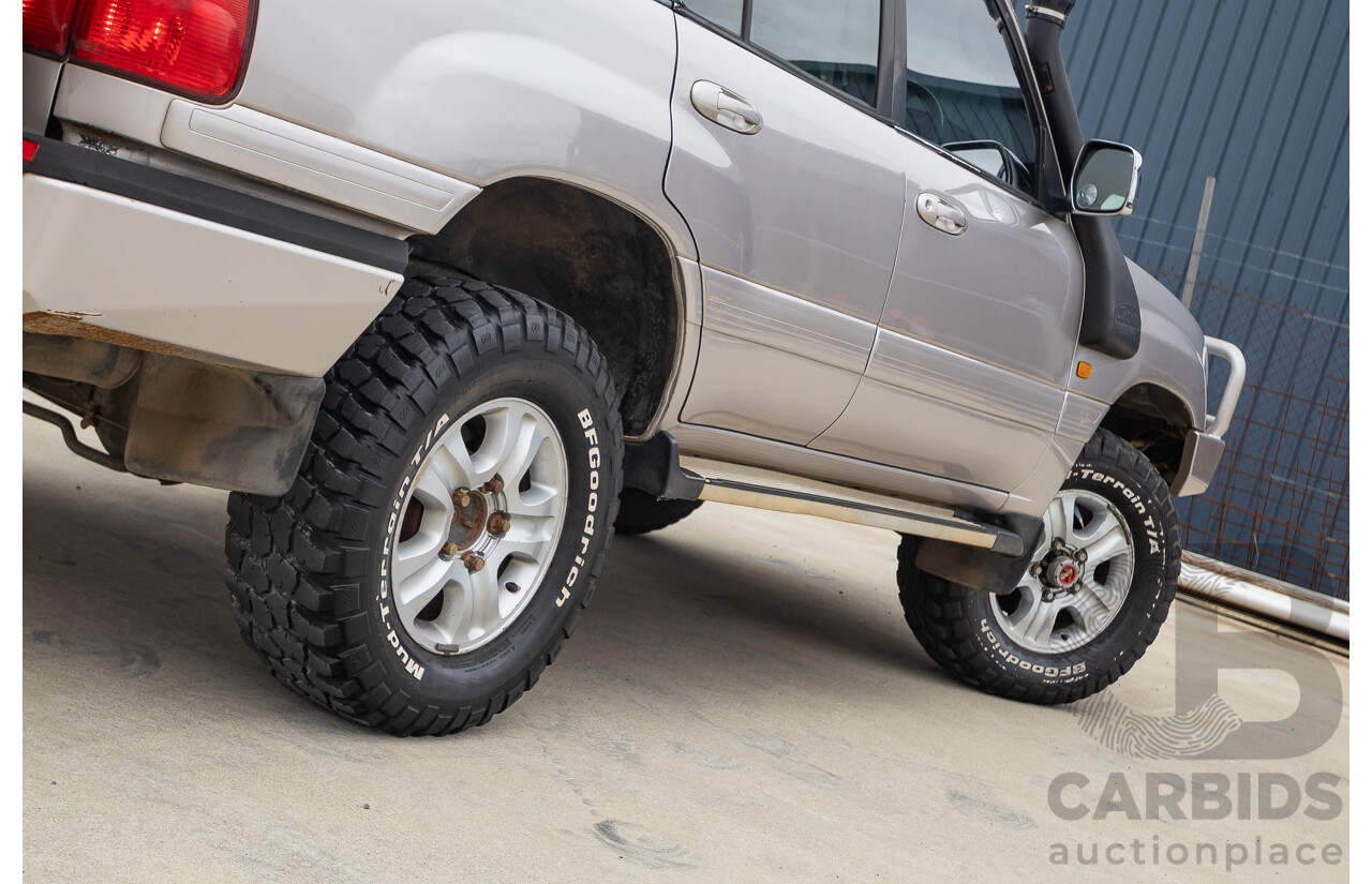 2/2004 Toyota Landcruiser Sahara (4x4) UZJ100R 4d Wagon Warm Silver Metallic V8 4.7L