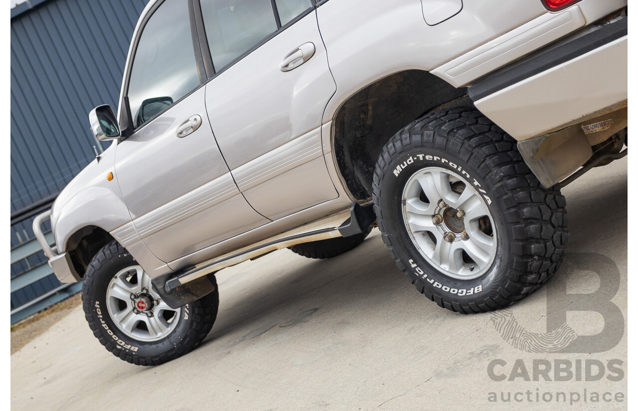 2/2004 Toyota Landcruiser Sahara (4x4) UZJ100R 4d Wagon Warm Silver Metallic V8 4.7L