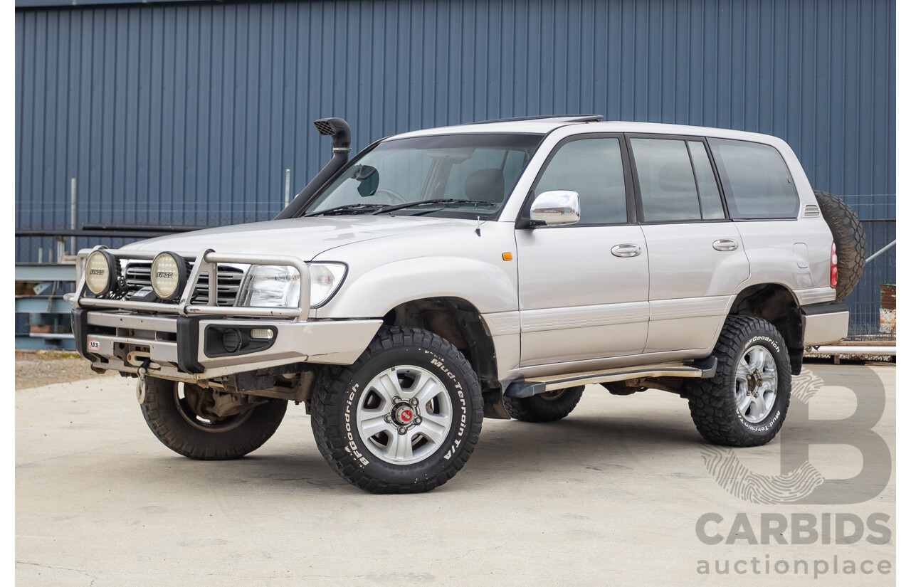 2/2004 Toyota Landcruiser Sahara (4x4) UZJ100R 4d Wagon Warm Silver Metallic V8 4.7L
