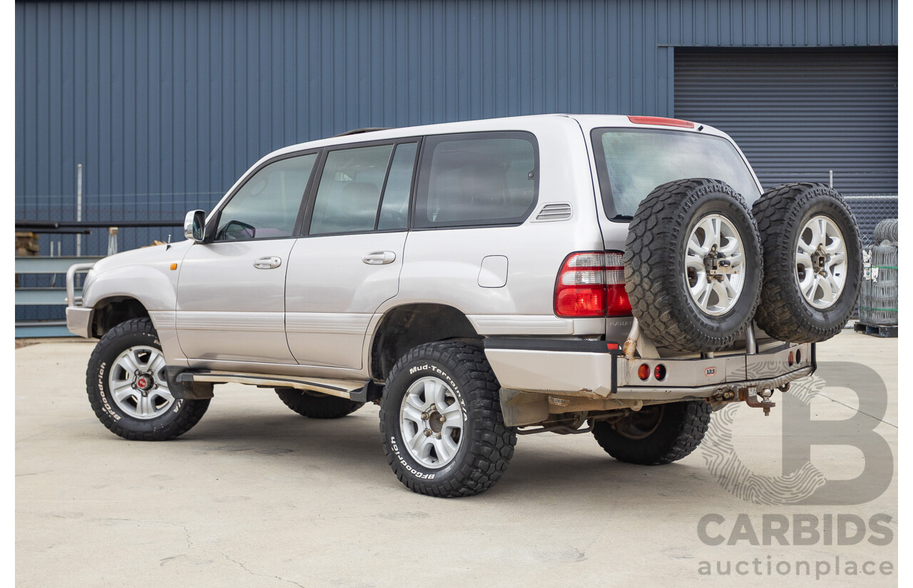 2/2004 Toyota Landcruiser Sahara (4x4) UZJ100R 4d Wagon Warm Silver Metallic V8 4.7L