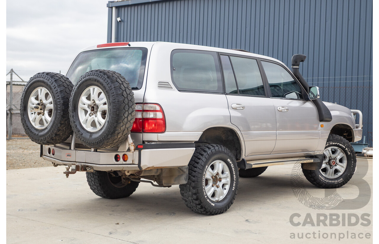 2/2004 Toyota Landcruiser Sahara (4x4) UZJ100R 4d Wagon Warm Silver Metallic V8 4.7L